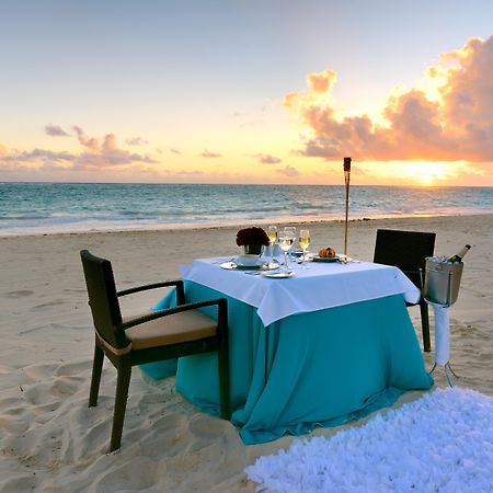 Occidental Punta Cana Exterior photo Sunset dinner at the beach